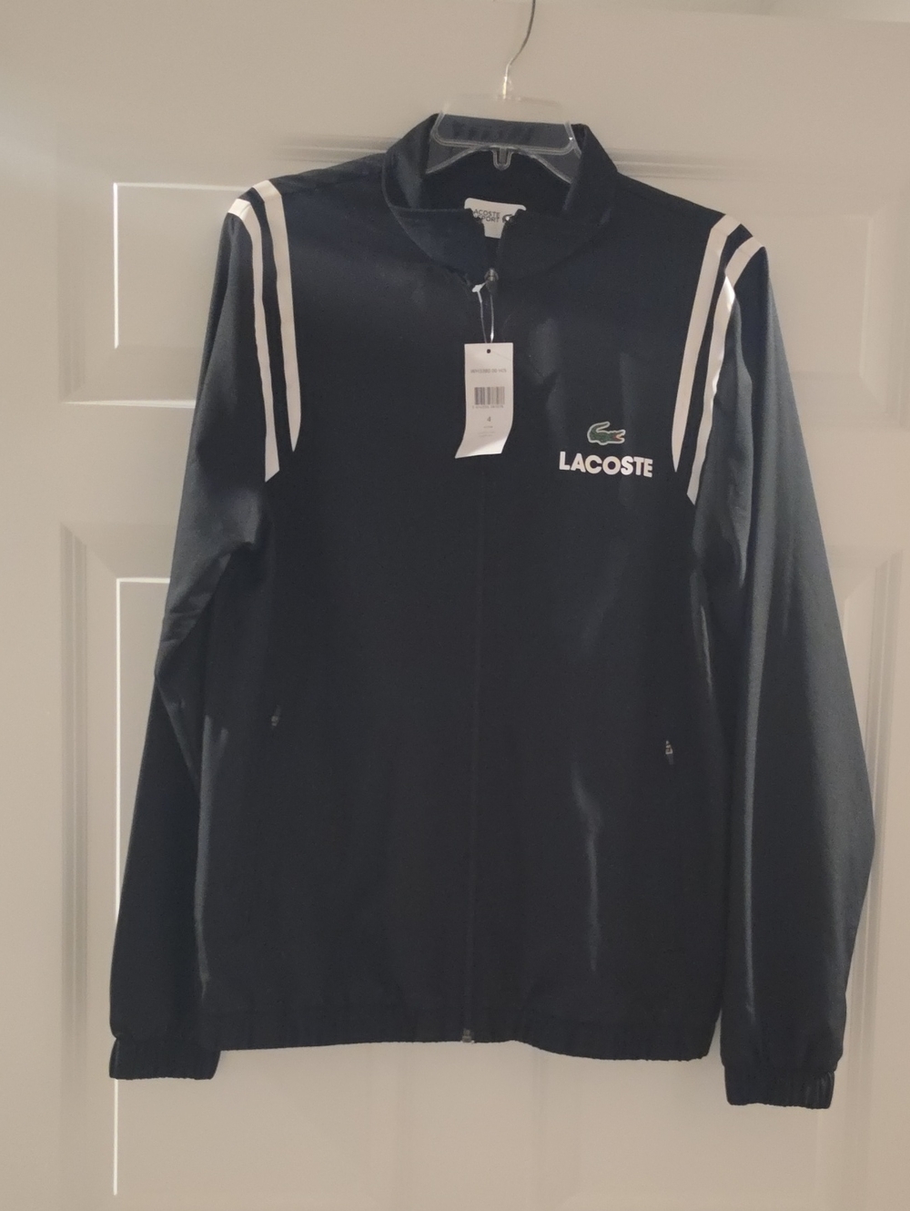 Lacoste Black Performance Jacket with White Shoulder Stripes